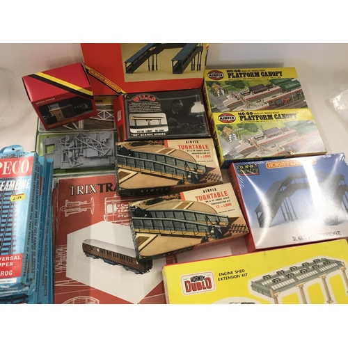 769 - A Collection of 00 Gauge boxed Track. Coach Kits. Platforms. Etc.