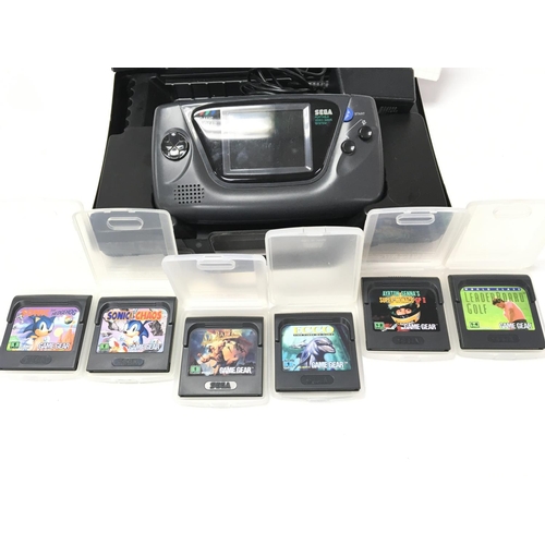 78 - A Sega Game Gear with 6 Games, carry case and T.V Tuner.