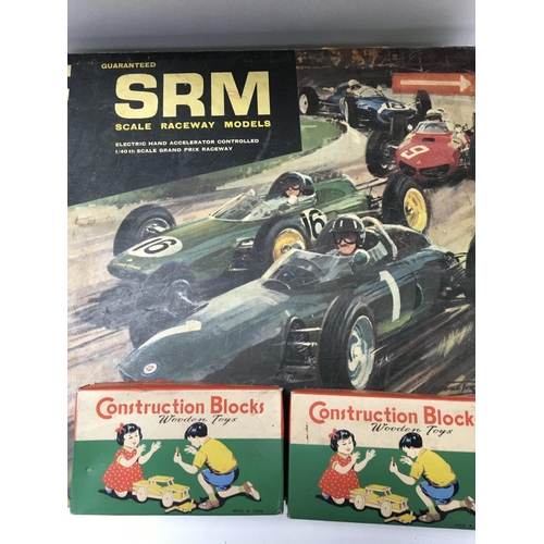 82 - A Collection of Board Games and a SRM Slot racing Track.(5)