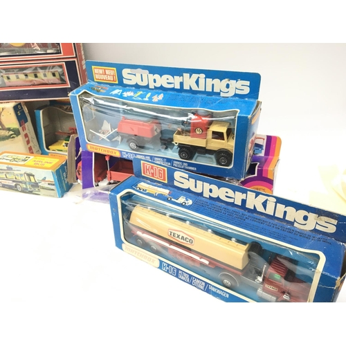 84 - A Box Containing a Collection of Various boxed Die-cast including Matchbox Super Kings. A Lima Train... 