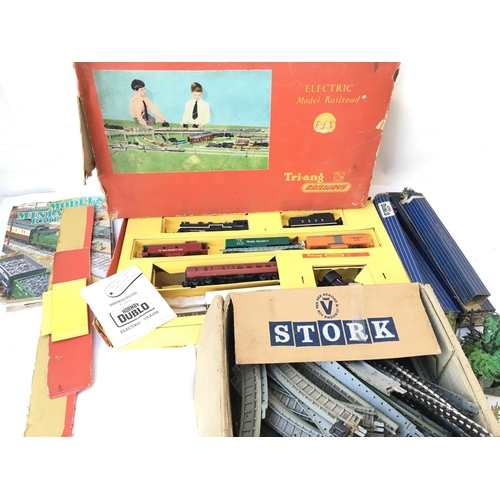 876 - A Boxed Tri-Ang Electric Model Railway with Track and Model Magazines.