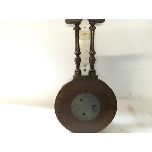 1728 - Antique barometer-thermometer in carved wooden vase. 40cm approx.