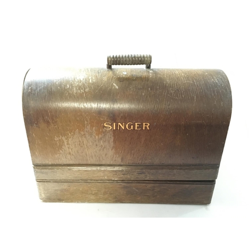 1729 - Singer manufacturing electric sewing machine c1921. With box and key.