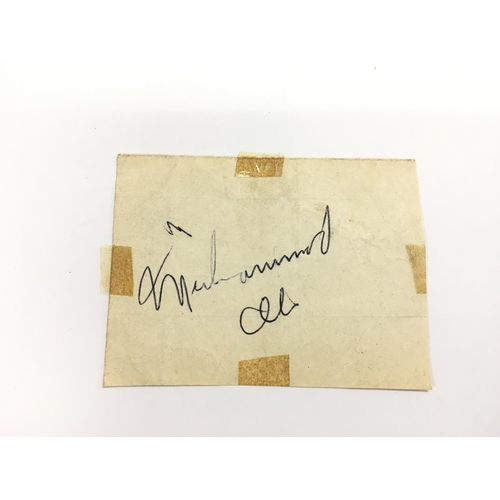 1736 - A Muhammad Ali autograph, no provenance. Please note that buyer's must satisfy themselves as to the ... 