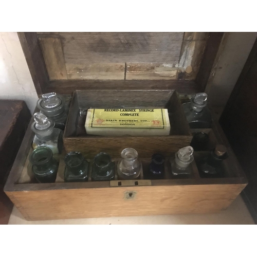 719 - Four Victorian boxes containing apothecary bottles.