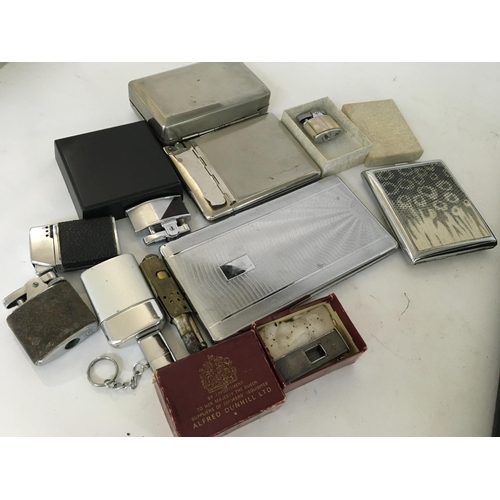 782 - A collection of lighters and cigarette cases various and two compacts