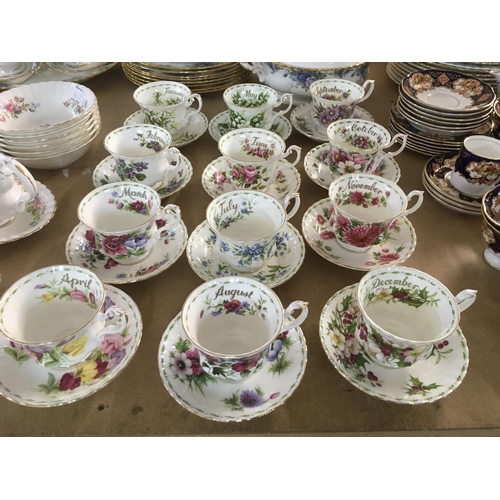 813 - A collection of Royal Albert flower of the month cups and saucers, first quality.