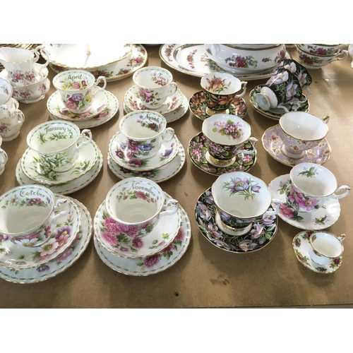 817 - Six Royal Albert flower of the month trios and eight cabinet cups and saucers, first and second qual... 