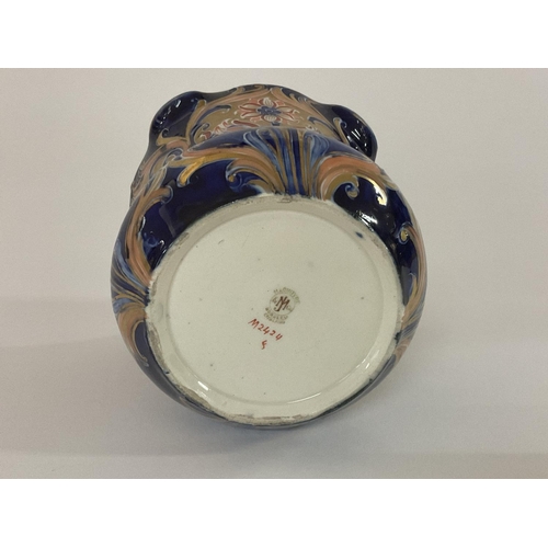 825 - A Moorcroft Macintyre fluted rim planter with Alahambra pattern. 11cm (some damage to rim).