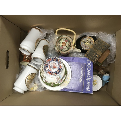 829 - A box of various ceramics including Royal Doulton, Wedgwood, Sylvac etc.