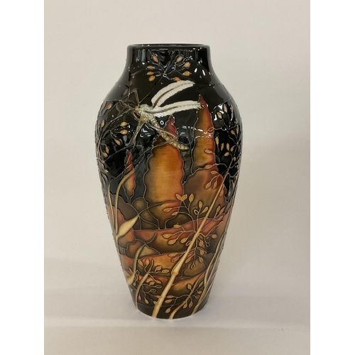 833 - A Moorcroft cranefly design vase by Paul Hilditch, Limited Edition 122/150, dated 2009. 21cm. (No da... 