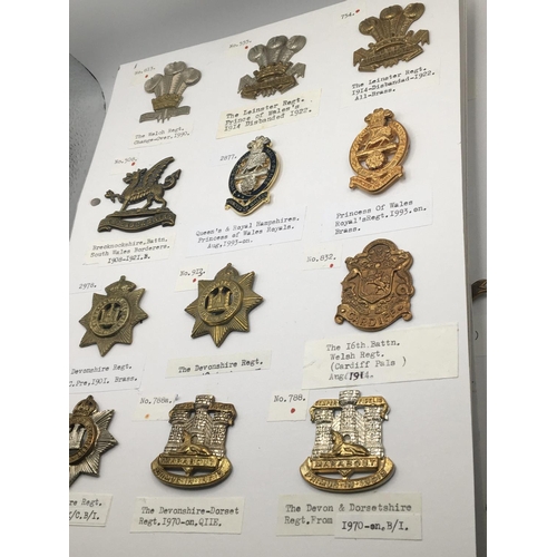 2015 - An album containing Military cap badges mainly county regiments on six cards with detailed descripti... 