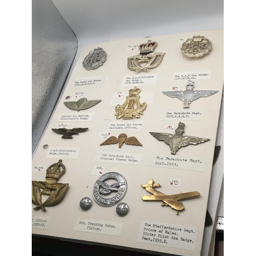 2019 - An album containing military and RAF badges some cloth badges including commando SAS Parachute regim... 