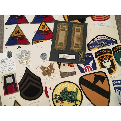 2067 - A collection of American military and Navy cloth badges and arm rank titles. (a lot)