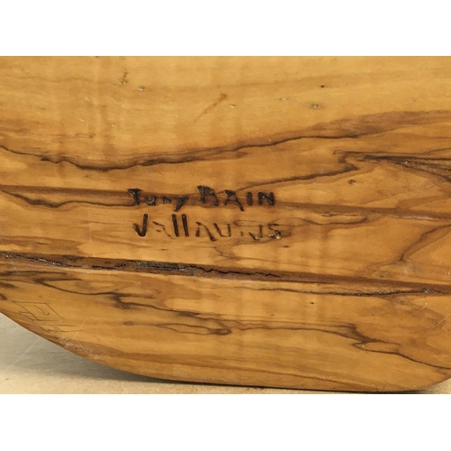 753 - A Tony Bain carved wooden bowl and one other similar bowl .