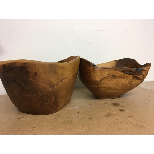 753 - A Tony Bain carved wooden bowl and one other similar bowl .