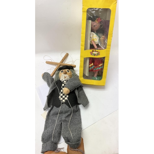 760 - A boxed vintage Pelham puppet and another puppet.