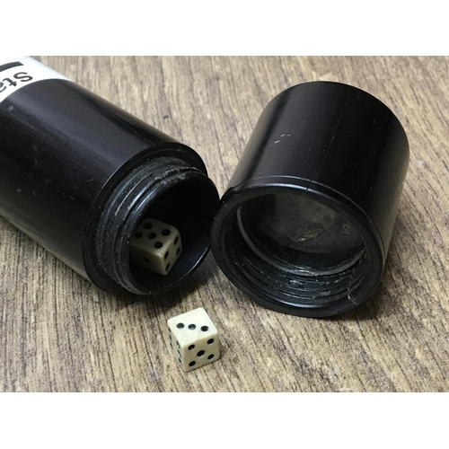767 - A novelty walking stick, the handle enclosing dice