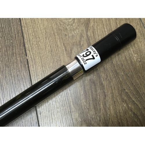 767 - A novelty walking stick, the handle enclosing dice