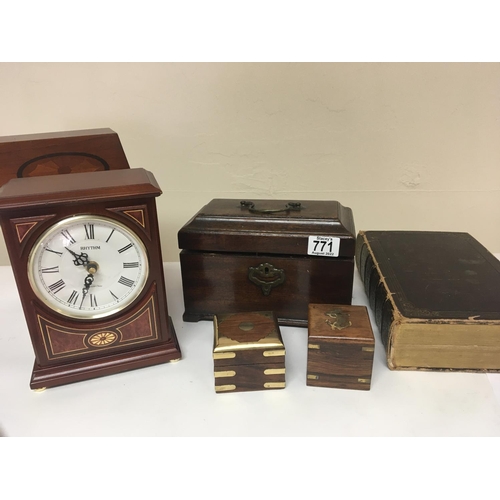 771 - A George III mahogany tea caddy other 20th century boxes a bible and other oddments .