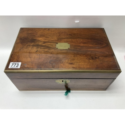 773 - A Victorian mahogany and brass bound writing slope.