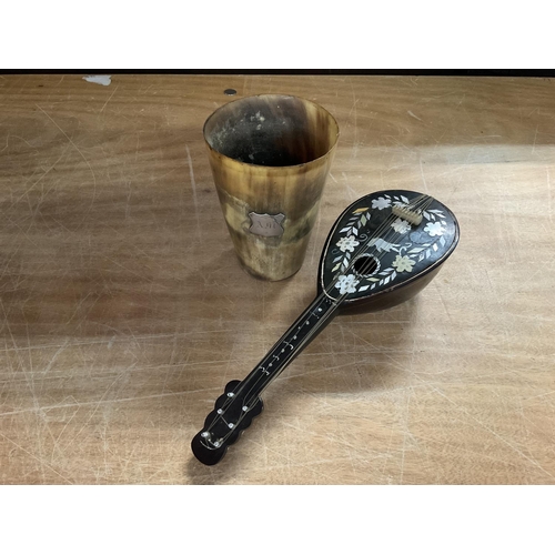 776 - Antique horn drinking flask with silver double ended on side for engraving and a small horn mandolin... 