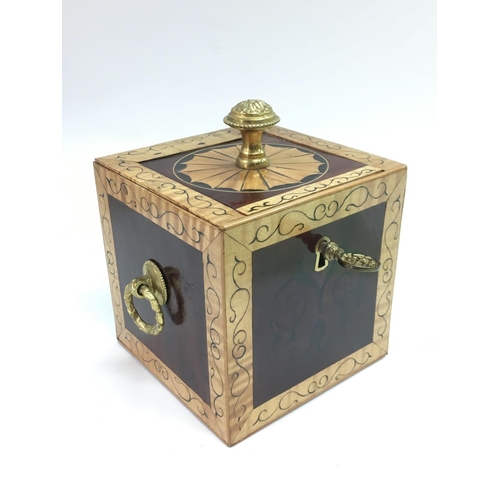 777 - An inlaid mahogany tea caddy with gilt metal mounts, approx 10cm x 10cm x 10cm.