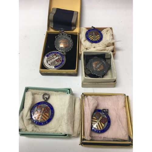 782 - A collection of sporting medallions including silver .