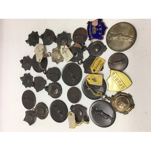 782 - A collection of sporting medallions including silver .