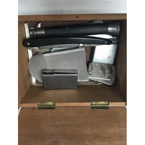 784 - A Dunhill lighter and a box of lighters various. Together with a pair of opera glasses and a corkscr... 
