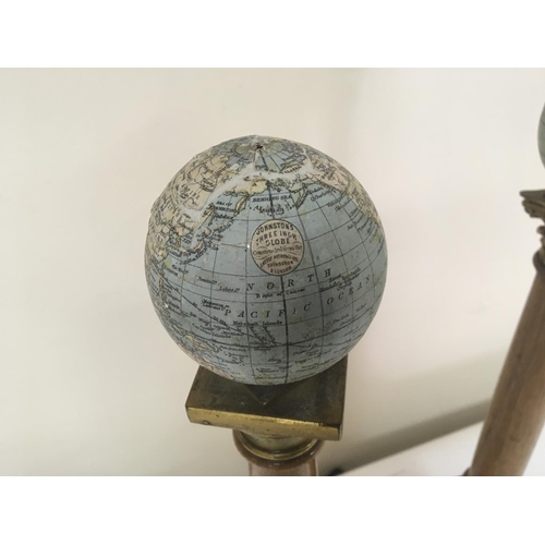 789 - Two Masonic early 20th century columns. Each surmounted with three inch Johnstons globes one of the ... 