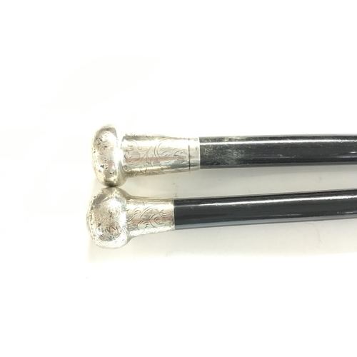 797 - 2 X Silver Toped Walking Sticks.