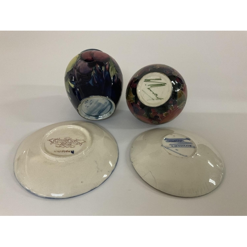 852 - Moorcroft pottery, 4 pieces to include A Wisteria Plum vase, 9.5cm, 1930s Pomegranate pattern vase, ... 