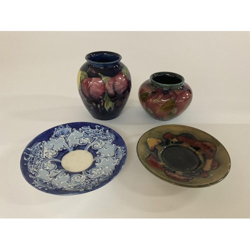 852 - Moorcroft pottery, 4 pieces to include A Wisteria Plum vase, 9.5cm, 1930s Pomegranate pattern vase, ... 