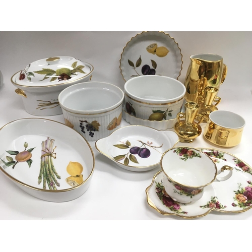 854 - A collection of Royal Worcester tableware in Evesham pattern, a Royal Albert cup and saucer in Old C... 