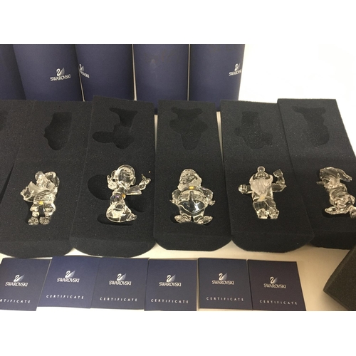 1013 - A collection of Swarovski Crystal Disney Figures The seven dwarfs with Crystal shoe and Snow White h... 