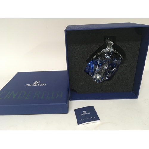 1018 - A rare Swarovski Crystal Disney figure of Cinderella with blue glass dress boxed. No damage.