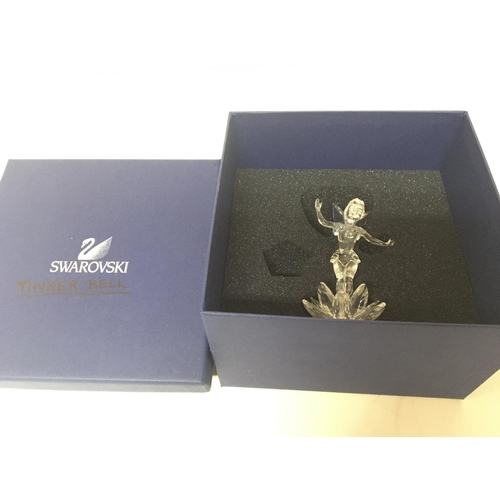 1020 - A Swarovski Disney Crystal figure of Tinker Bell in a fitted box no damage.with annual Disney 2008 p... 