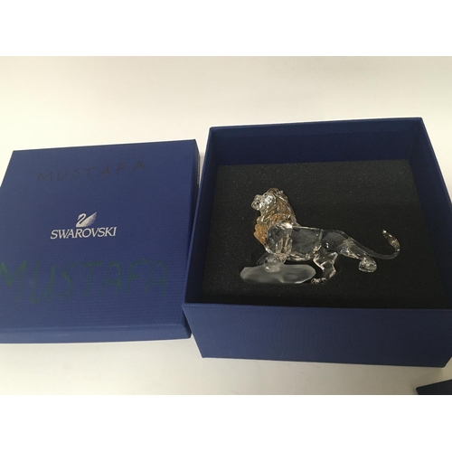 1024 - A Swarovski Disney Crystal figure of Mufasa The Lion from The Lion King no damage boxed.sold with Li... 