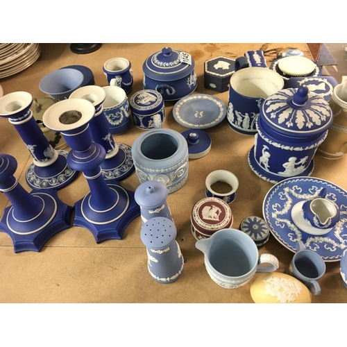 1046 - A Collection Of Wedgwood jasper ware including candle sticks , trinket boxes jugs , and pin dishes ,