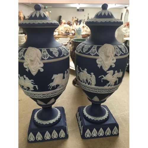 1048 - A pair of jasper ware Adams vases decorated with classical scenes and seven other vases .