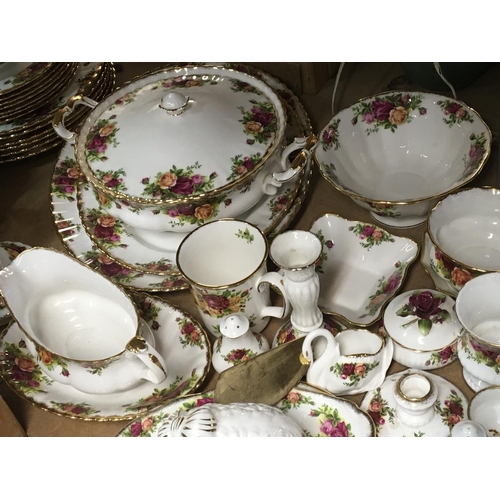 1065 - An Extensive Royal Albert old English country rose tea and dinner set. With a comport telephone tabl... 