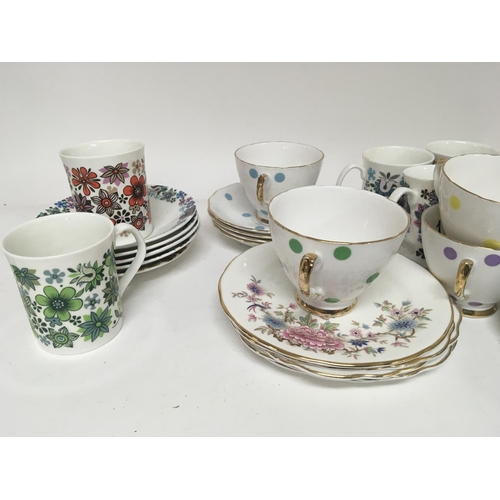 1069 - An Art Deco design English Porcelain Delphine China tea set a Royal Vale poker dot part set and Carn... 