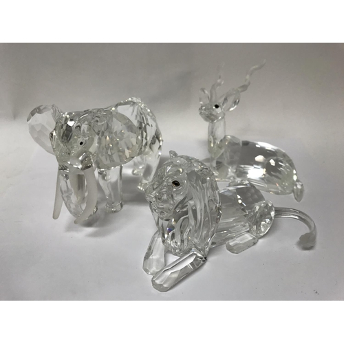 1081 - Three boxed Swarovski Crystal animals including Inspiration of Africa- Kudu, Elephant and Lion