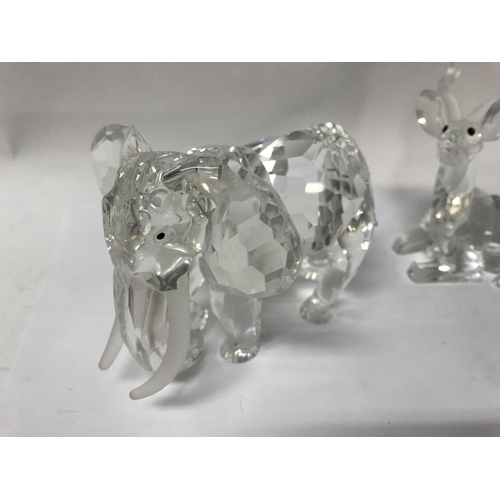 1081 - Three boxed Swarovski Crystal animals including Inspiration of Africa- Kudu, Elephant and Lion