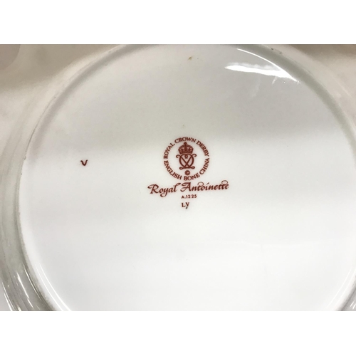 1105 - A royal crown derby plate and small dish.