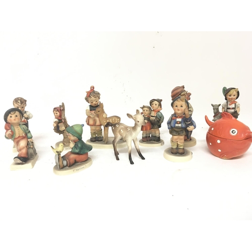 1144 - A collection of vintage ceramic Hummel figures and other oddments.