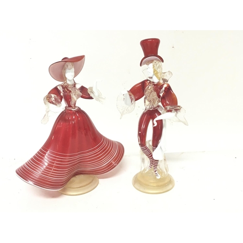 1145 - A Pair of red and white glass Murano figures a dancing couple Hight 25cm.