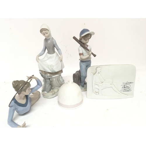 1148 - Three Lladro figures a Lladro bell and collectors plaque no damage.