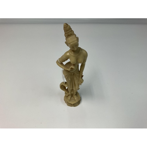 1162 - A statue of Hindu God Shiva dancing with a cobra, approximately 31cm tall. NO RESERVE